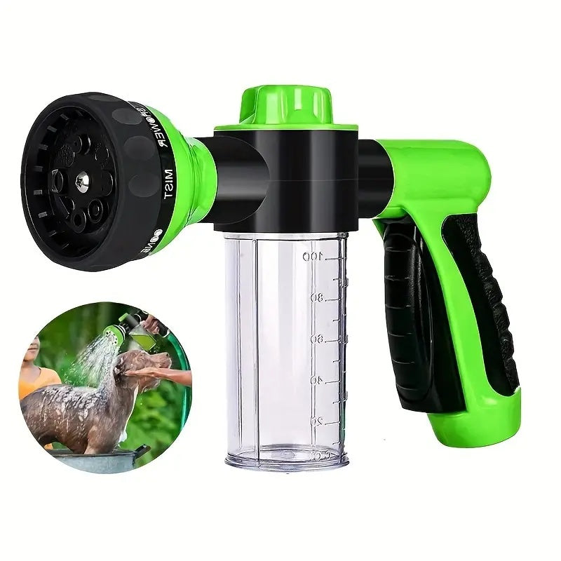 Green and black garden hose sprayer with nozzle on a white background