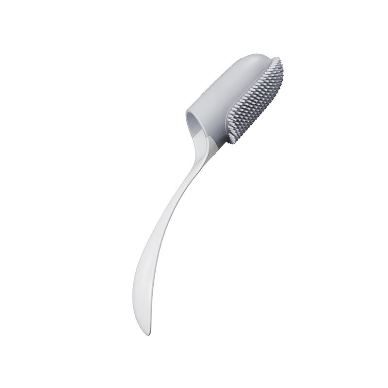 White kitchen brush with bristle head on a white background