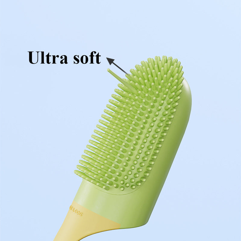Green hairbrush with ultra soft bristles on a light blue background