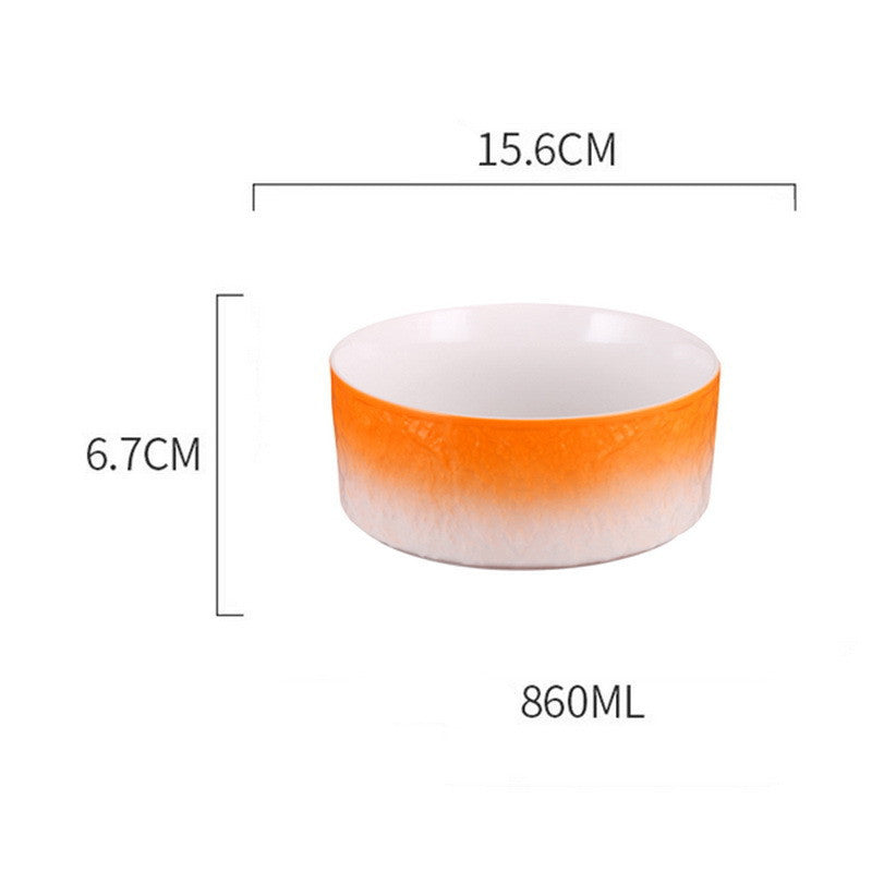 White bowl with orange rim and measurements on a white background