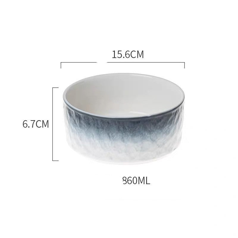 Ceramic bowl with gradient design and measurements on a white background